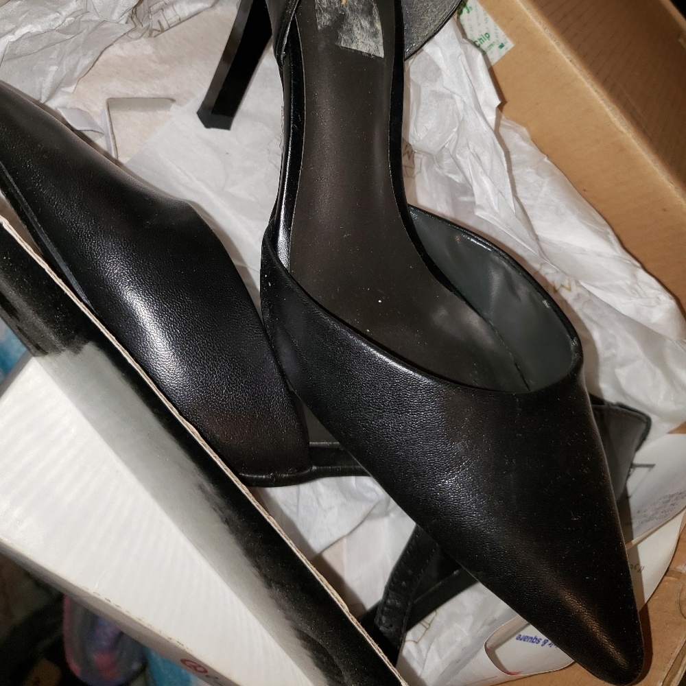 Pointy black sling back heels